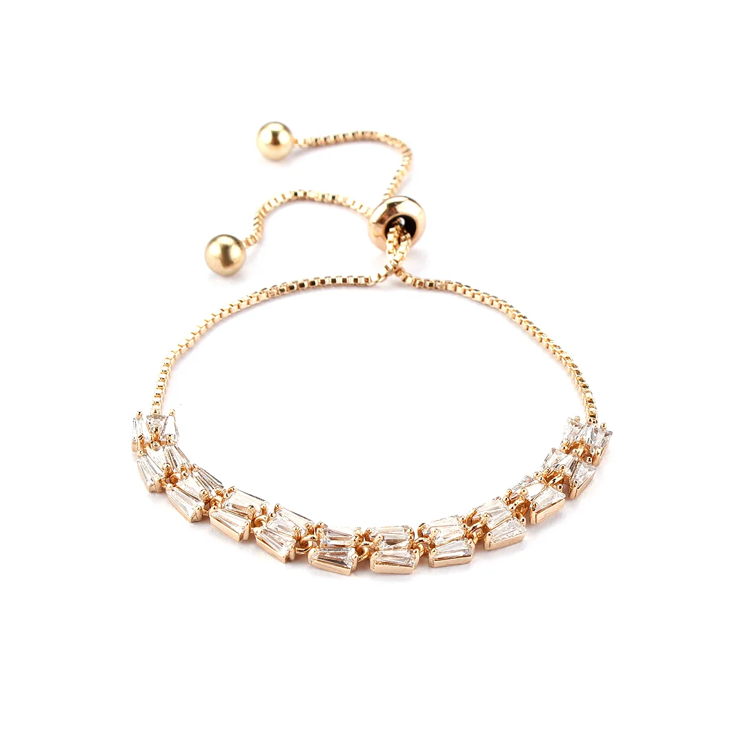Goldfarbenes Armband mit Baguette-Kristallen