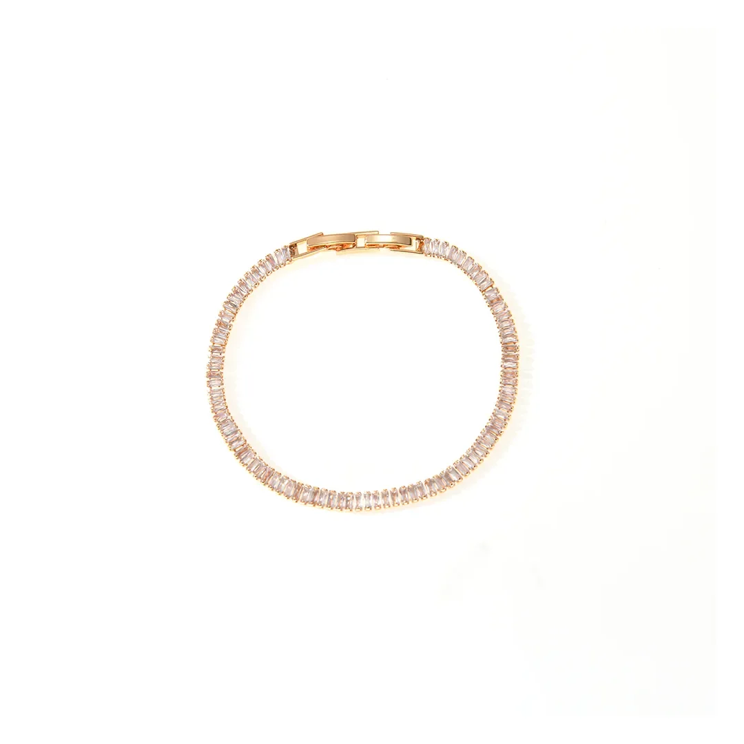 Pulsera de línea de cristales en tono oro rosa