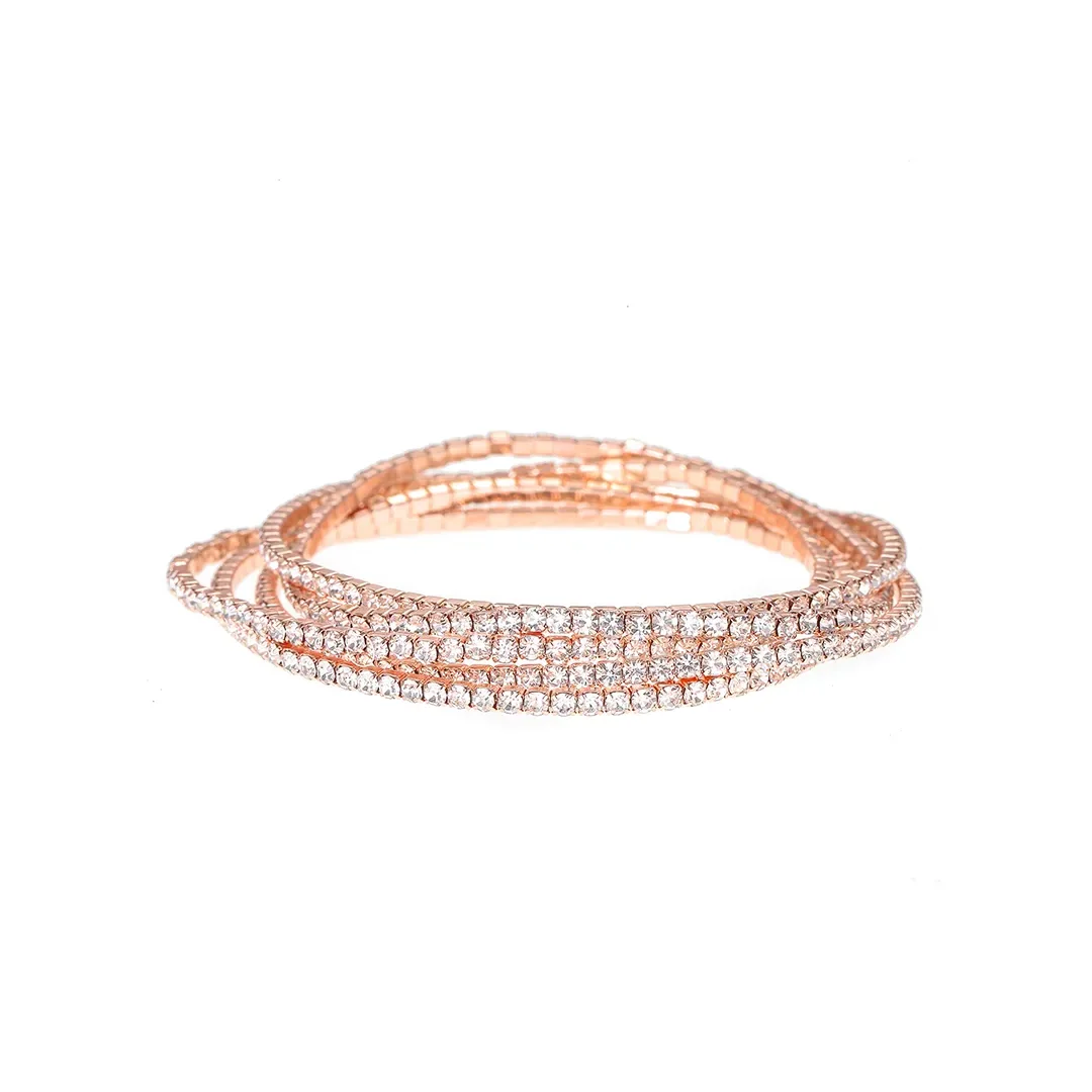 Ensemble de bracelets aux tons roses à superposer